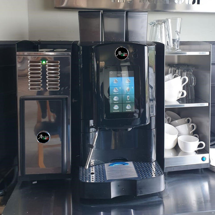 Absolute Ultra coffee machine with cup warmer and milk fridge at The Barn Owl Inn, Lymm
